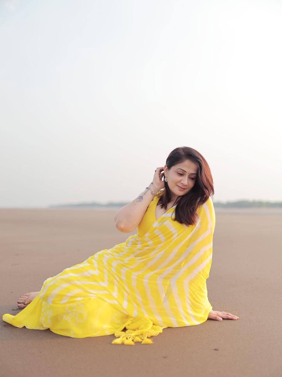 Yellow Leheriya Saree with Tassels
