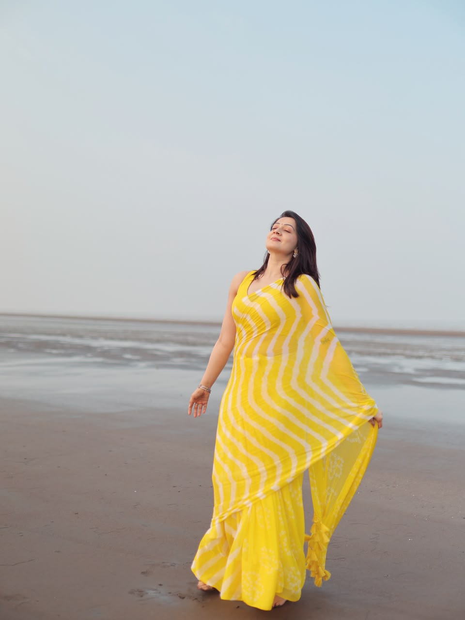 Yellow Leheriya Saree with Tassels