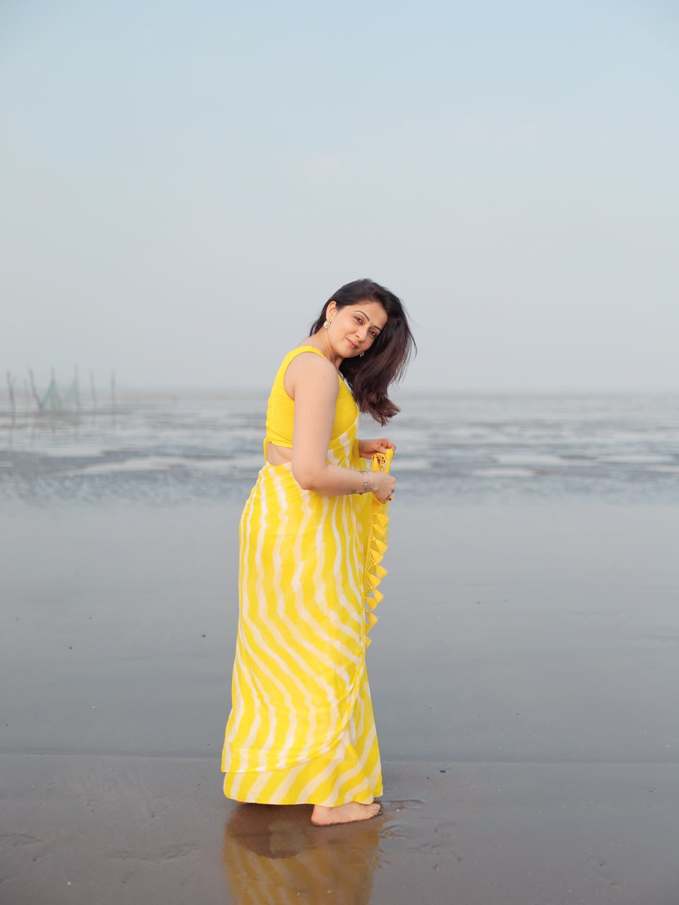 Yellow Leheriya Saree with Tassels