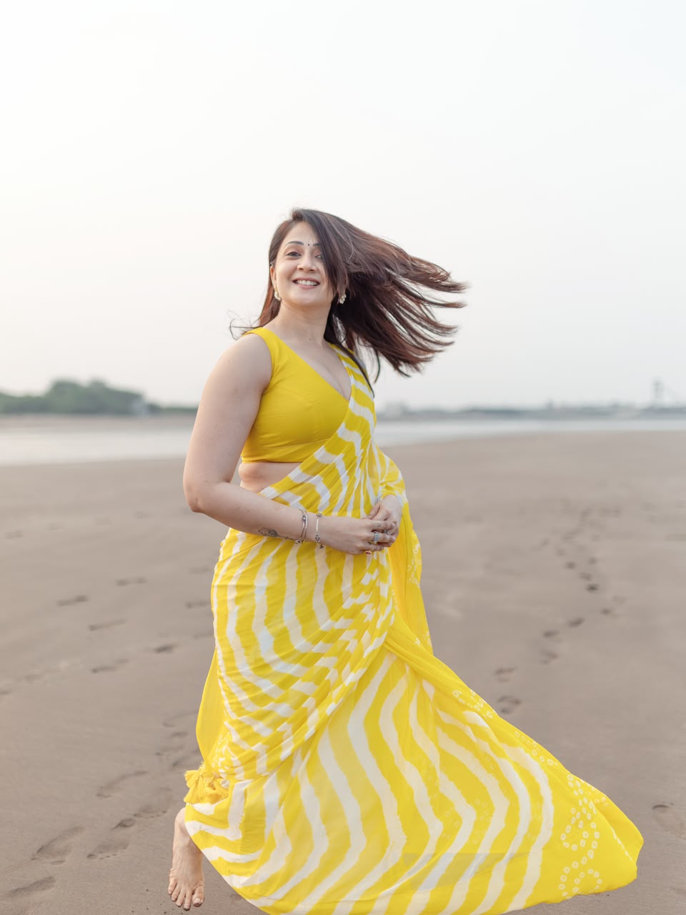 Yellow Leheriya Saree with Tassels