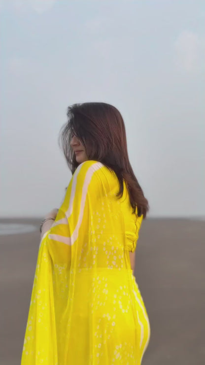 Yellow Leheriya Saree with Tassels